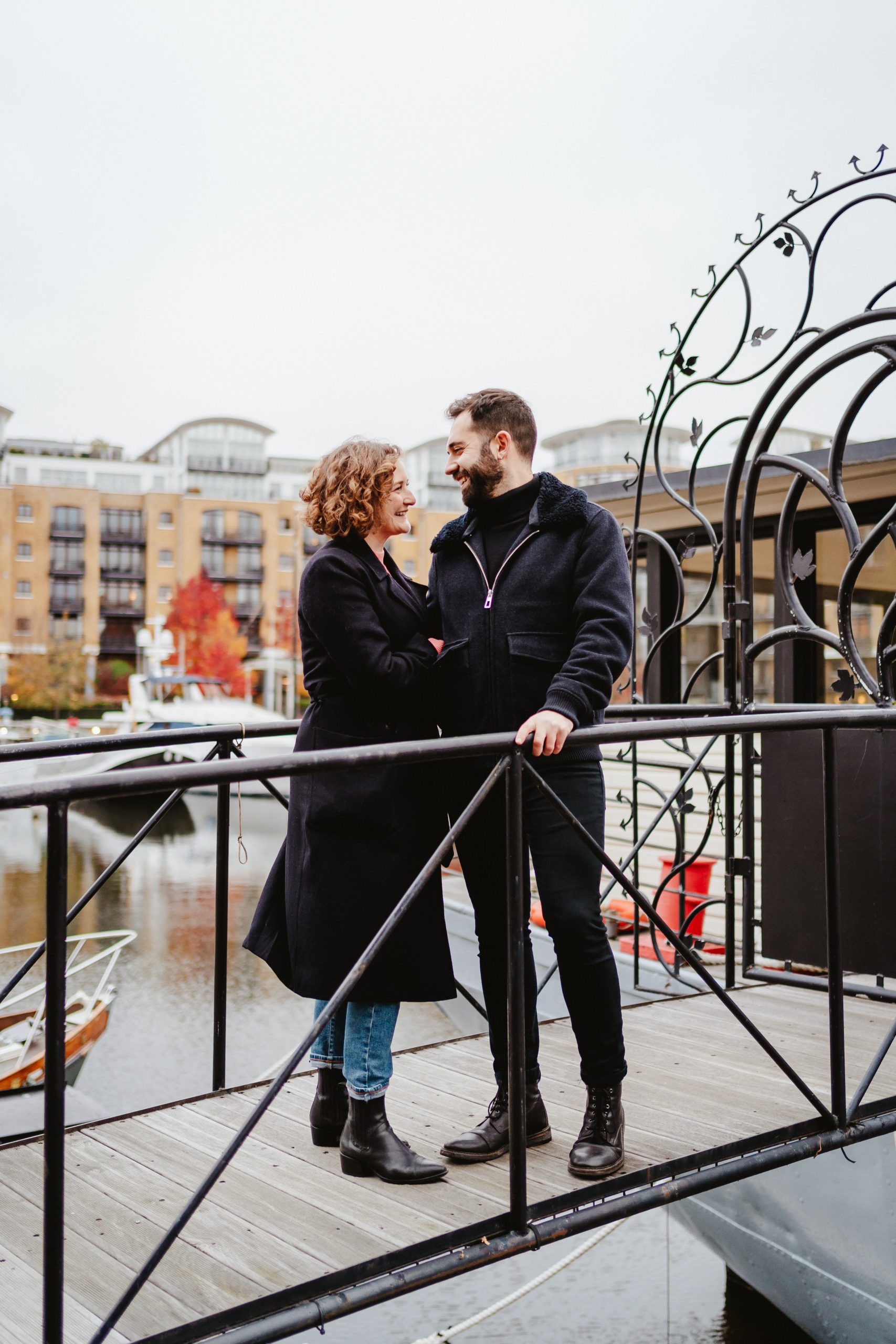 Becki and Albie couple shoot on a bridge in Wapping
